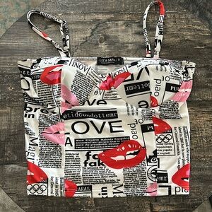 Small newspaper/lip pattern crop